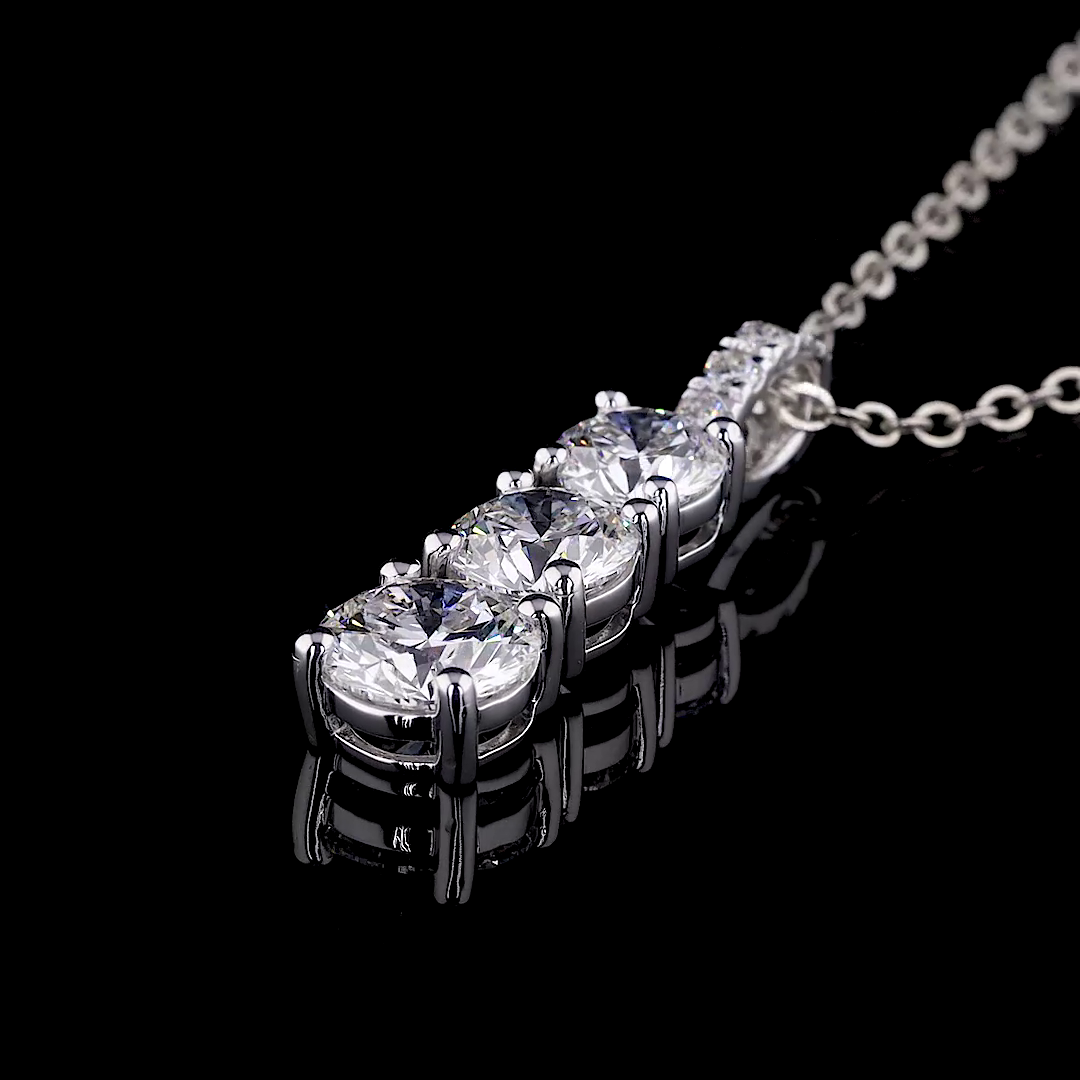 the trio | 3.25 carat graduated three stone round diamond drop pendant
