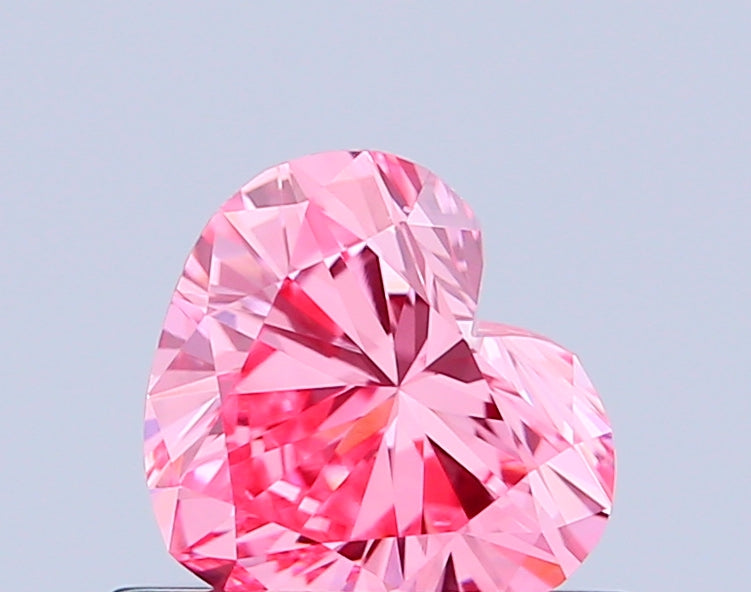 heart 0.47 carat fancy vivid pink vs1  vg vg slight