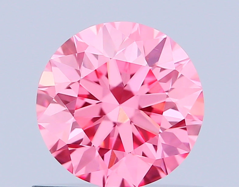 round 0.64 carat fancy vivid pink vs1 ex ex vg slight