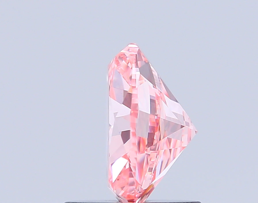 freeform faceted 1.21 carat fancy vivid pink vvs2  vg ex strong