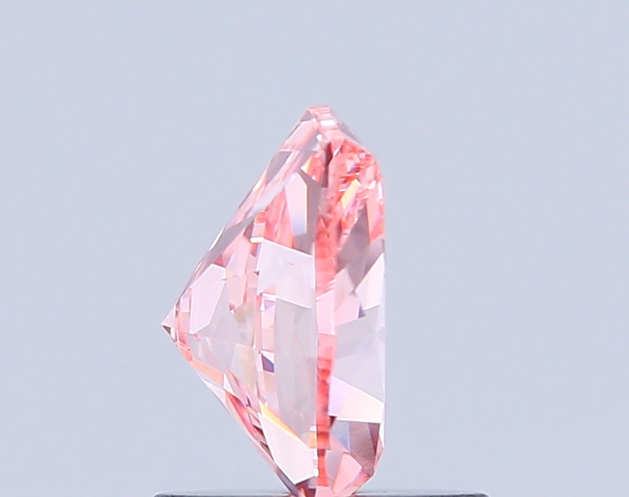 freeform faceted 1.21 carat fancy vivid pink vvs2  vg ex strong