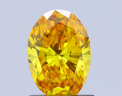 OVAL 0.99 CARAT FANCY VIVID YELLOW VS2  VG VG NONE