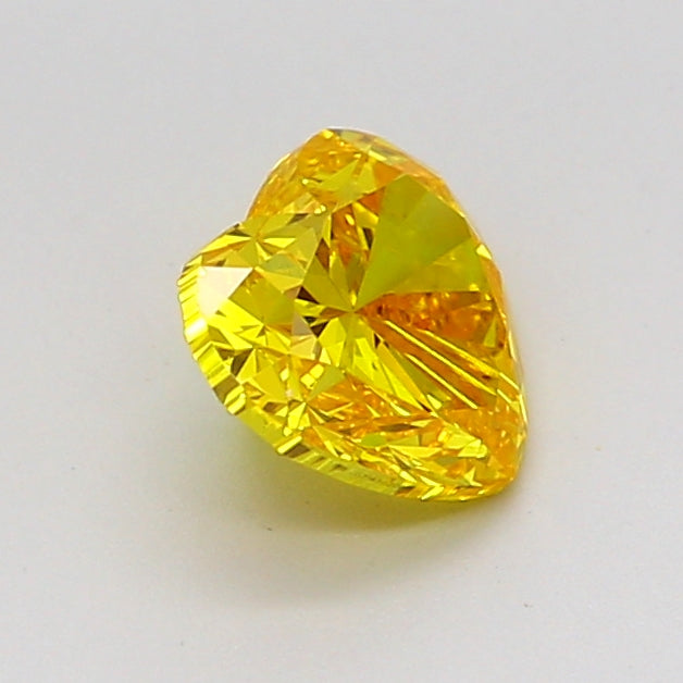 heart 0.96 carat fancy vivid yellow vvs2  vg ex none