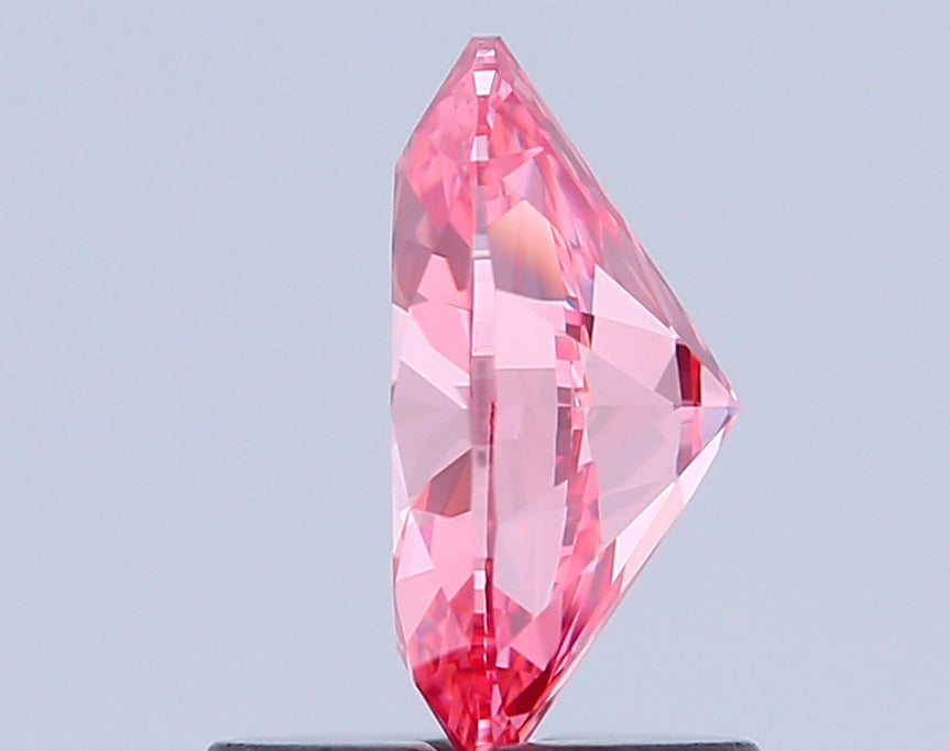 oval 1.05 carat fancy vivid pink vvs2  ex ex strong