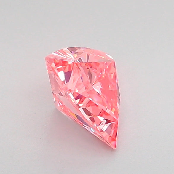 triangular 0.69 carat fancy vivid pink vvs2  vg vg strong