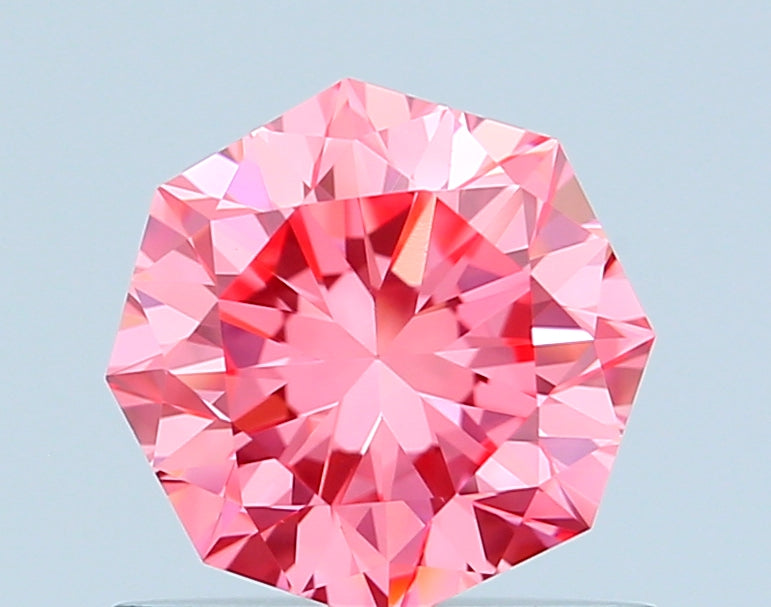 octagonal 0.75 carat fancy vivid pink vvs2  ex ex slight