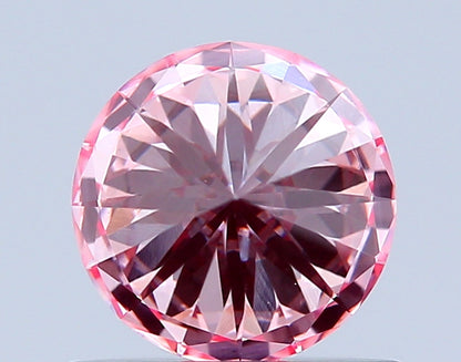 ROUND 0.69 CARAT FANCY INTENSE PINK VS1 ID EX EX SLIGHT
