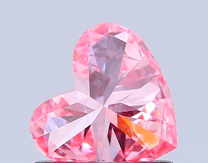 heart 0.76 carat fancy vivid pink vvs2  vg vg strong