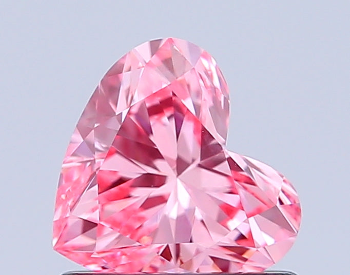 heart 0.76 carat fancy vivid pink vvs2  vg vg strong