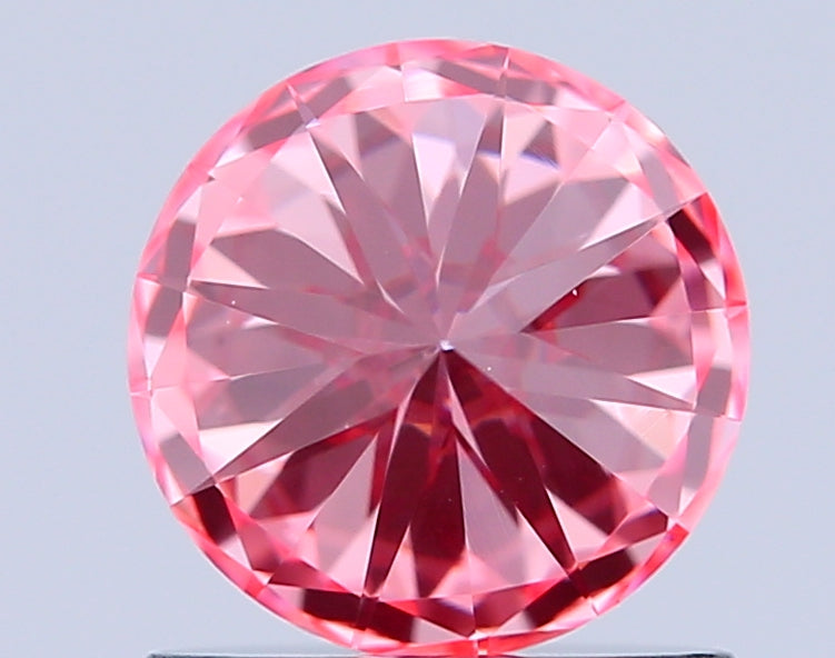 round 0.9 carat fancy vivid pink vs1 id vg ex slight