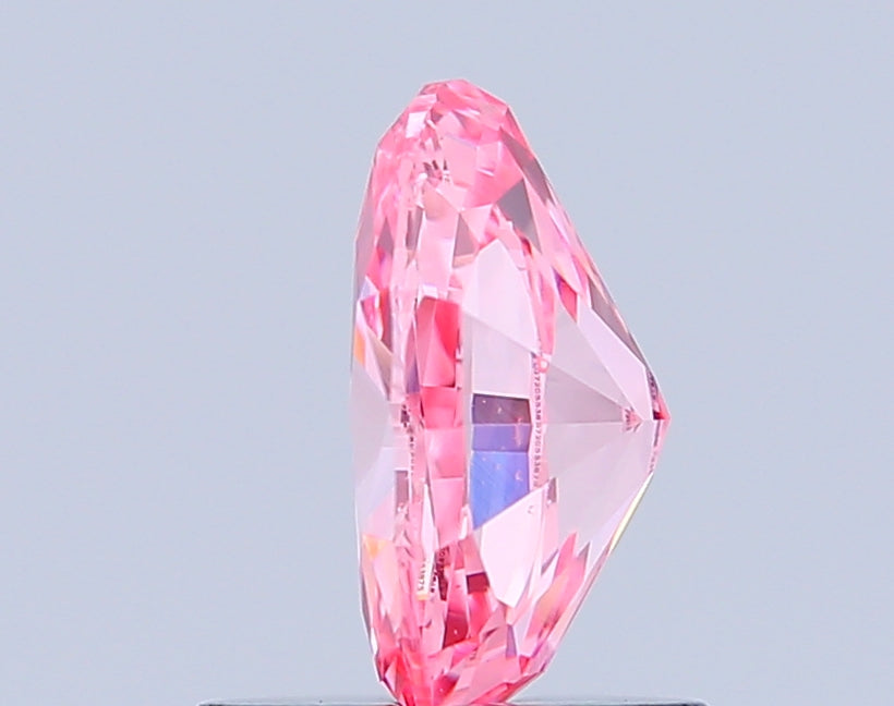 oval 1.02 carat fancy vivid pink vs1  vg vg strong