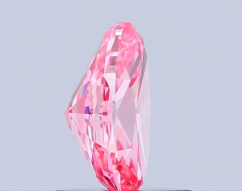 oval 1.02 carat fancy vivid pink vs1  vg vg strong