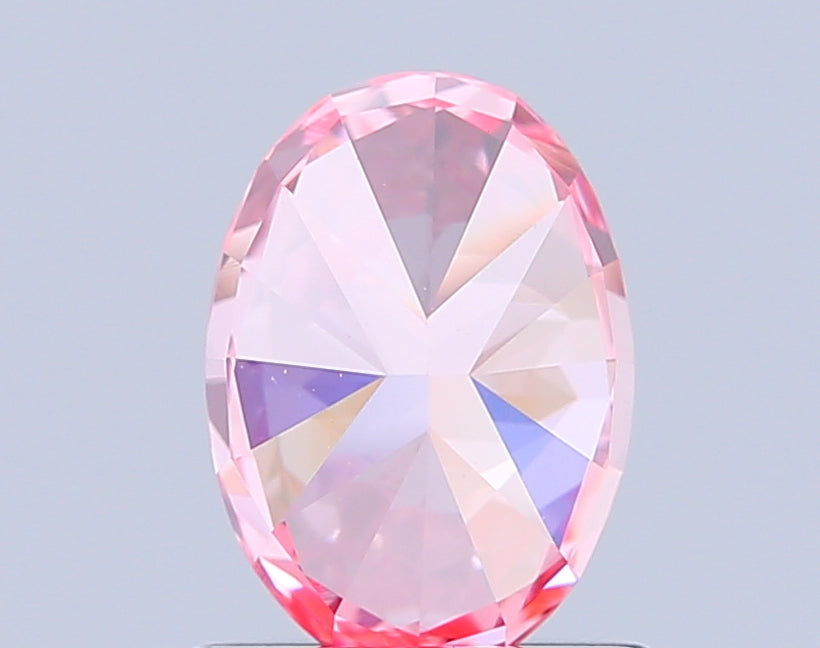 oval 1.09 carat fancy vivid pink vvs2  vg vg strong