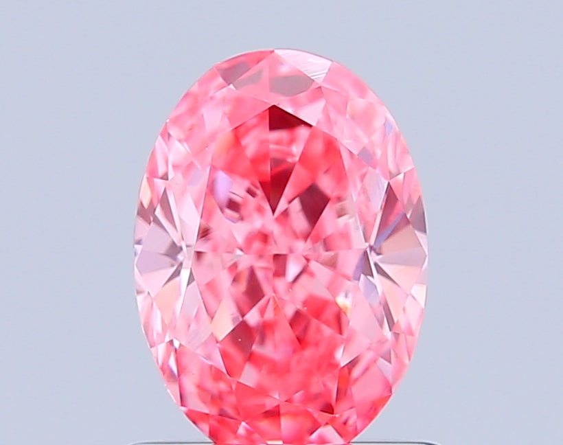 oval 1.09 carat fancy vivid pink vvs2  vg vg strong
