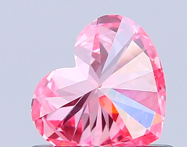 heart 0.65 carat fancy vivid pink vs1  vg vg strong