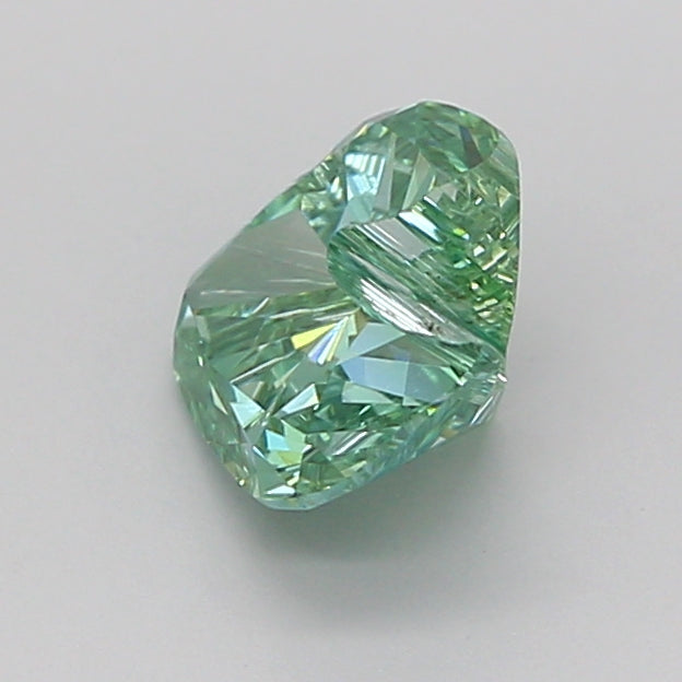 freeform faceted 1.09 carat fancy vivid green vs1  ex ex none