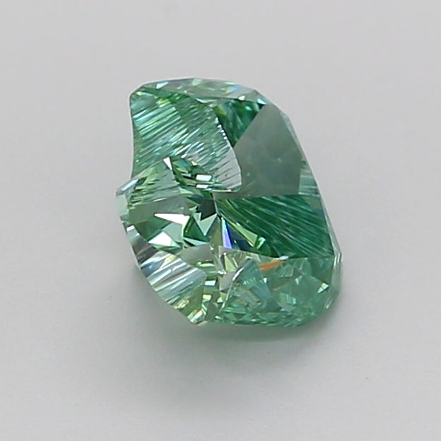 freeform faceted 1.09 carat fancy vivid green vs1  ex ex none