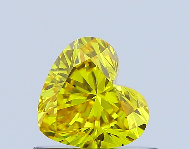 heart 0.52 carat fancy vivid yellow vs1  vg ex none