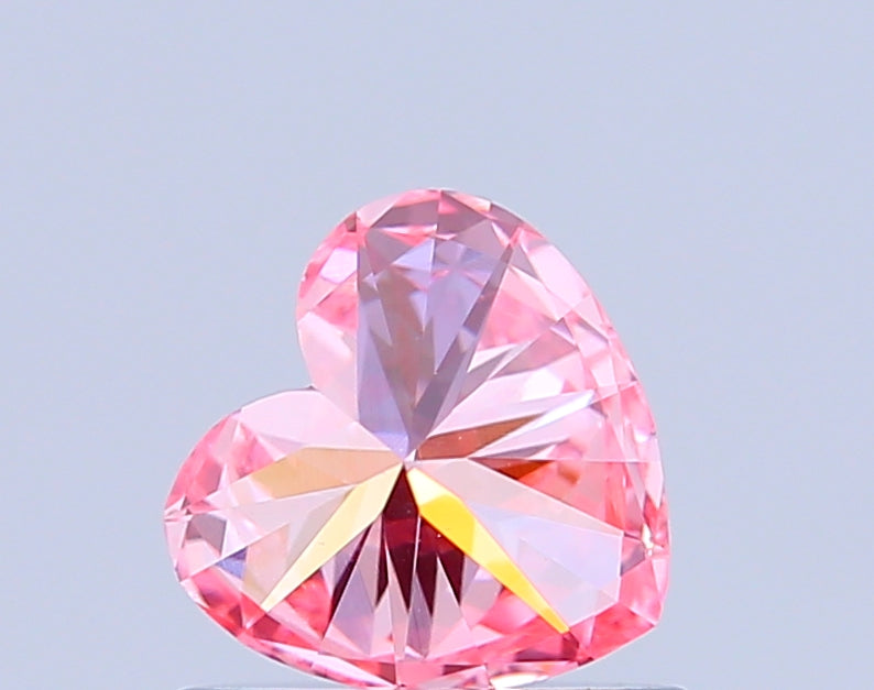 heart 0.7 carat fancy vivid pink vs1  vg ex strong