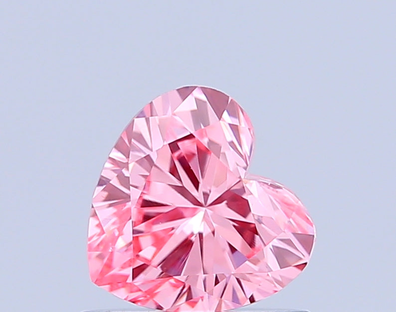 heart 0.7 carat fancy vivid pink vs1  vg ex strong