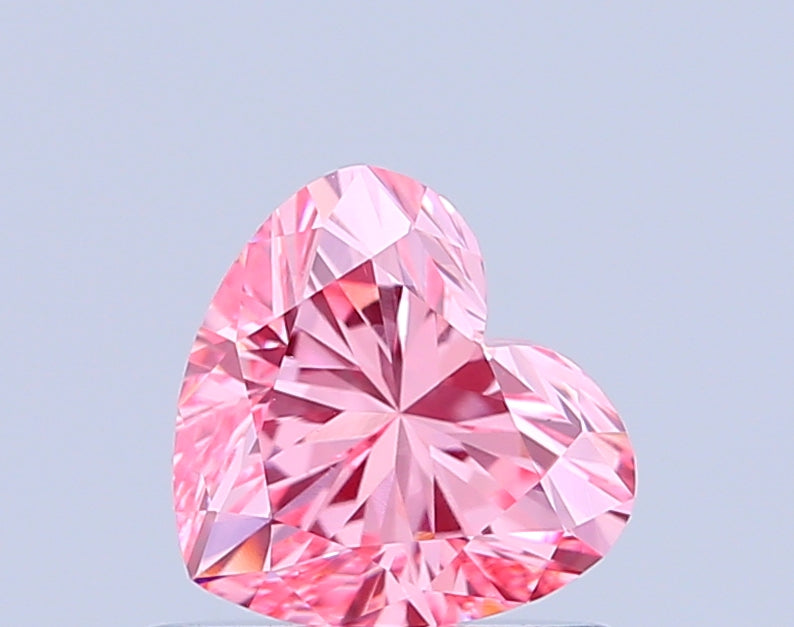 heart 0.77 carat fancy vivid pink vs1  vg vg strong