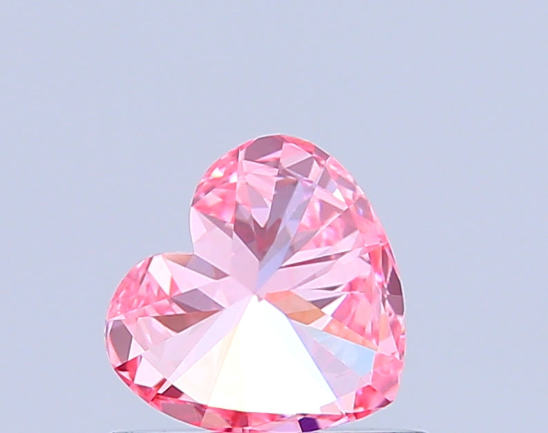 heart 0.6 carat fancy vivid pink vvs2  vg vg strong