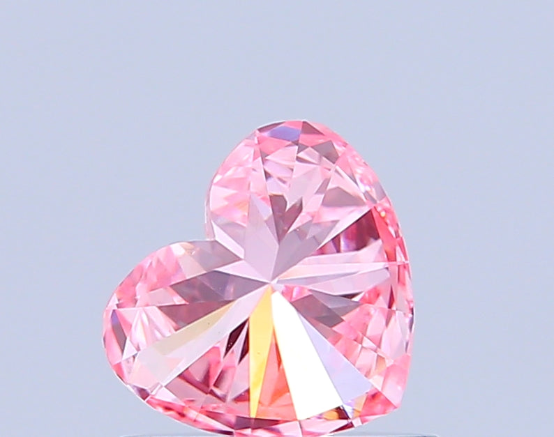 heart 0.66 carat fancy vivid pink vvs2  vg vg strong