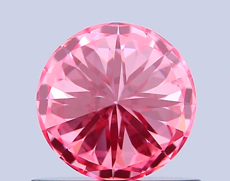 round 0.64 carat fancy vivid pink vvs2 ex vg ex slight