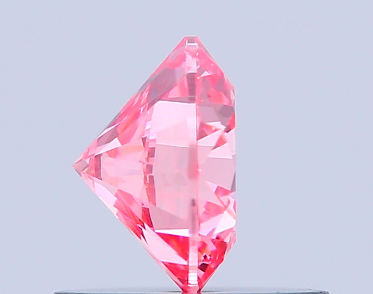 round 0.64 carat fancy vivid pink vvs2 ex vg ex slight