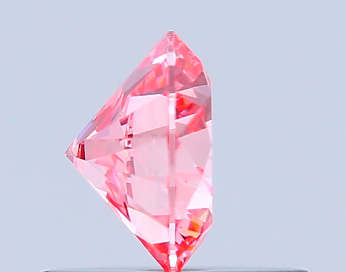 round 0.55 carat fancy vivid pink vvs1 ex vg ex slight