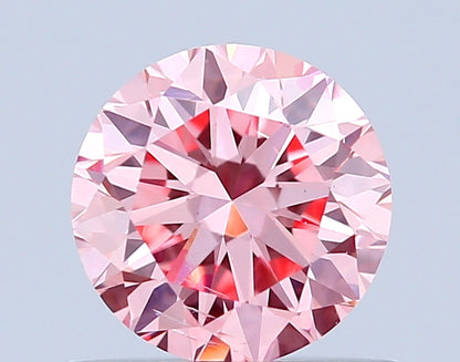 ROUND 0.73 CARAT FANCY INTENSE PINK SI1 EX EX VG SLIGHT