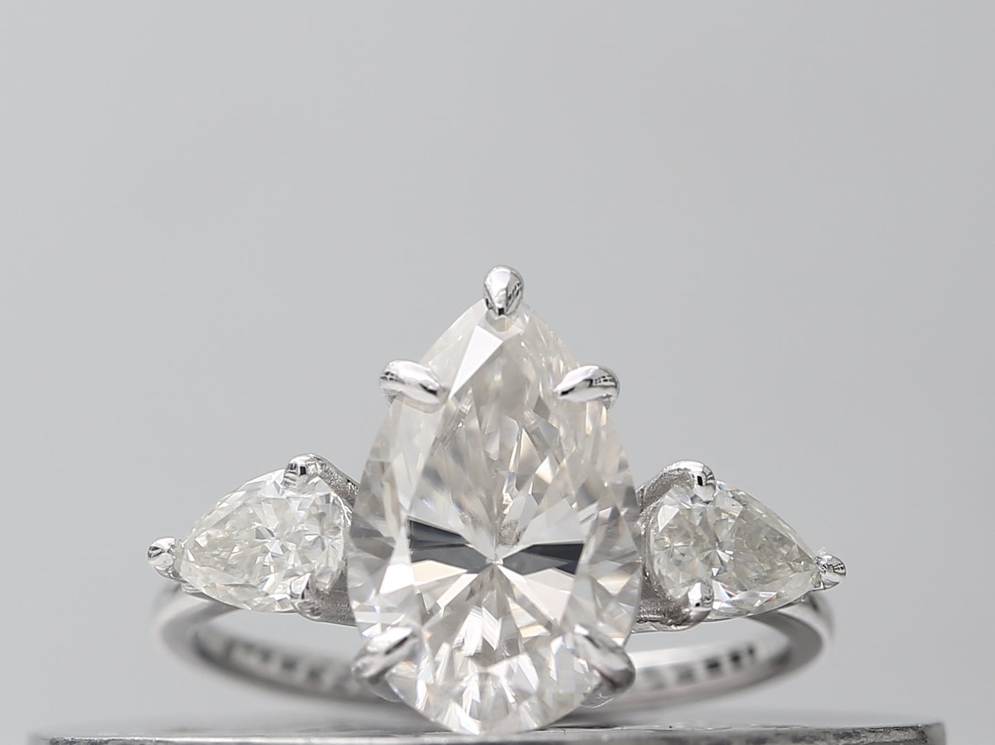 3 carat pear cut moissanite diamond three stone engagement ring