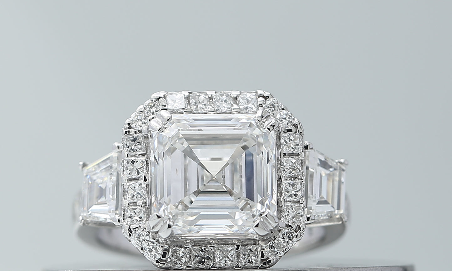 3 carat asscher cut halo style cvd lab grown diamond engagement ring in 14k gold with trapezoid side diamond